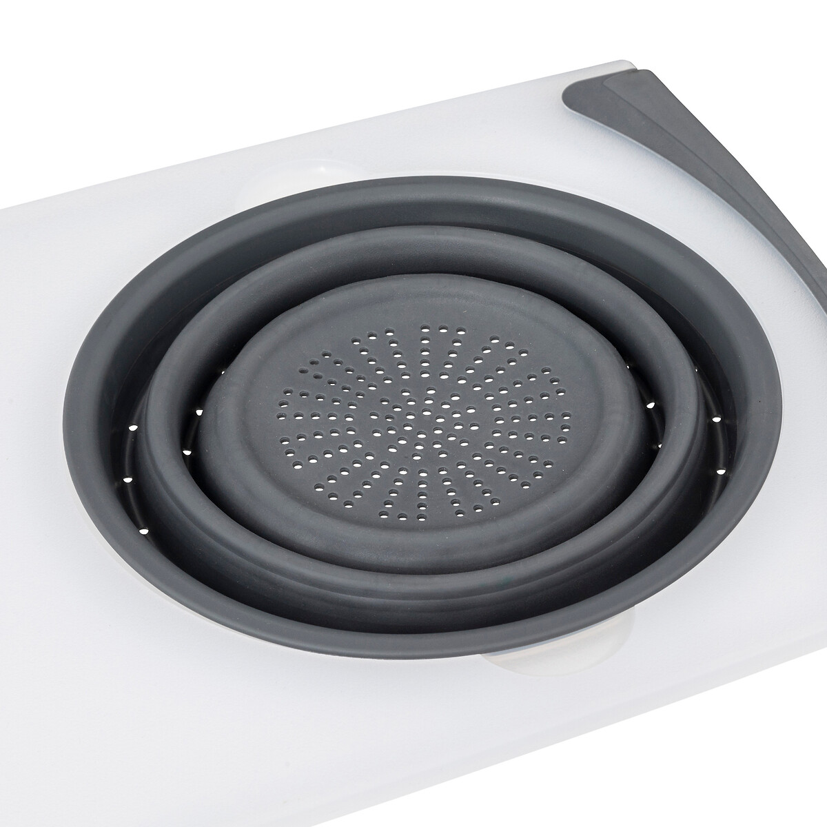 Planche à découper avec passoir retractable 